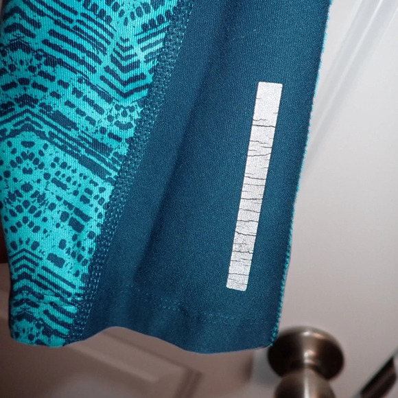 Nike Dri-Fit Cropped Running Leggings in Blue size S - Picture 4 of 14